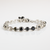 Small Flower Cluster Bracelet in "Obsidian Shores" - Rhodium